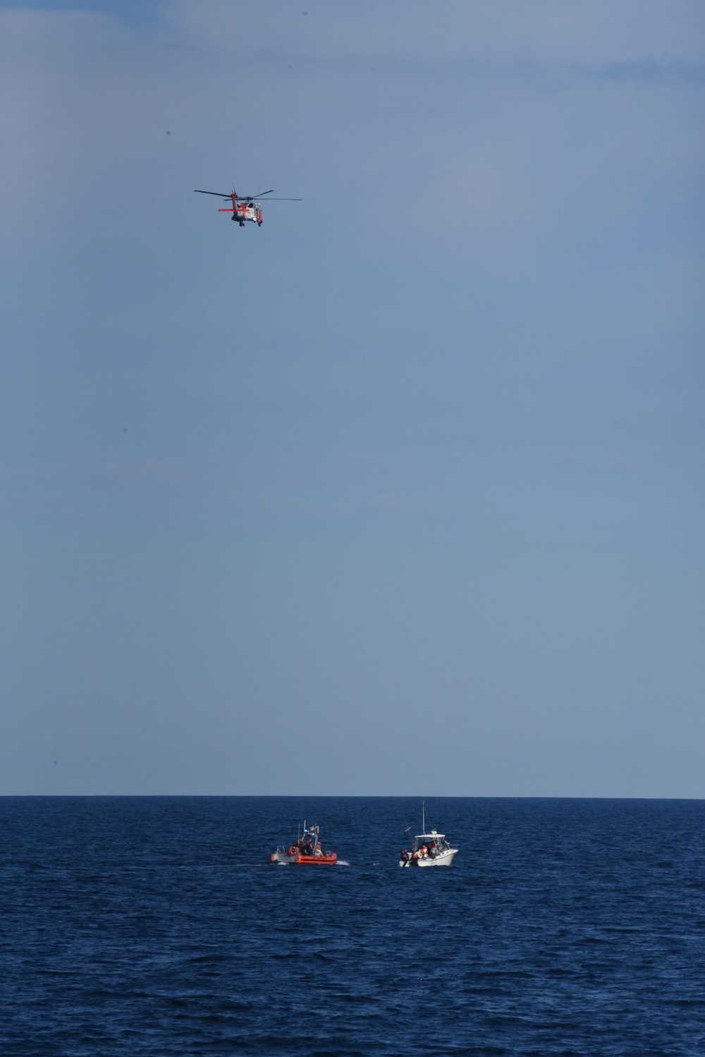 Coast Guard dewaters, tows sinking boat with 4 people aboard 32 miles off Wachapreague