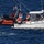 Coast Guard dewaters, tows sinking boat with 4 people aboard 32 miles off Wachapreague