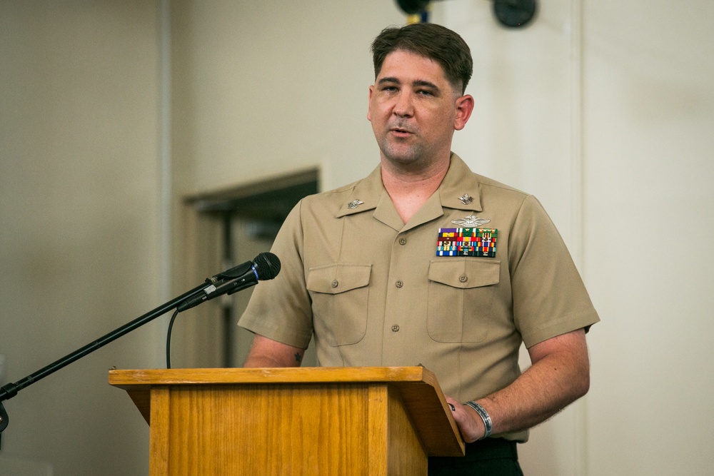 Marines and Sailors with 3d Marine Logistics Group celebrate the 123rd Birthday of the U.S. Navy Hospital Corpsmen