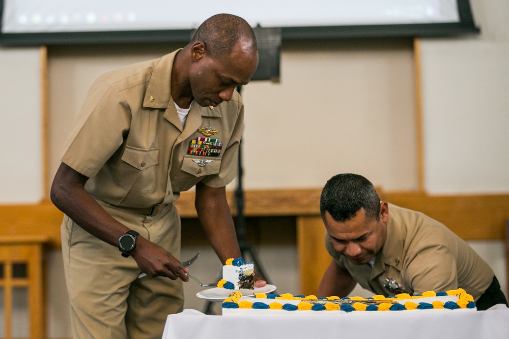 Marines and Sailors with 3d Marine Logistics Group celebrate the 123rd Birthday of the U.S. Navy Hospital Corpsmen