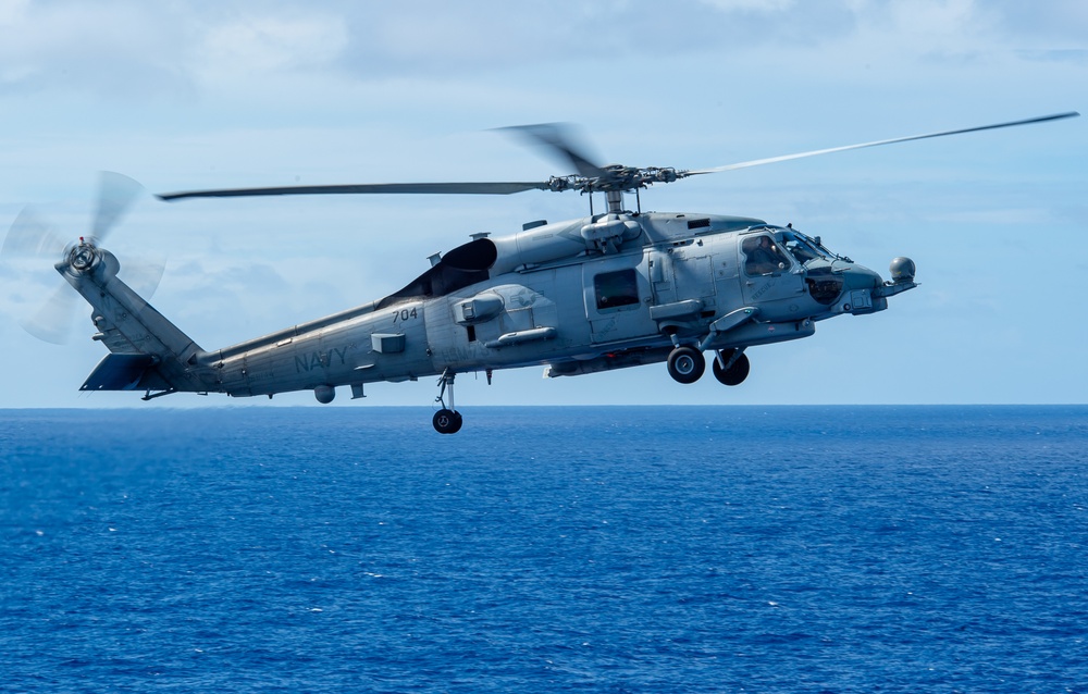 MH-60R Sea Hawk Prepares to land on Flight Deck of USS Carl Vinson (CVN 70)
