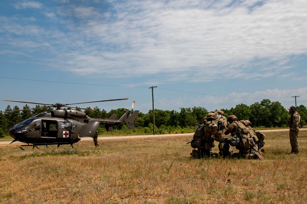 Army and Air National Guardsmen simulate transporting casualties during PATRIOT 21