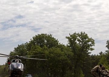 Army and Air National Guardsmen simulate transporting casualties during PATRIOT 21