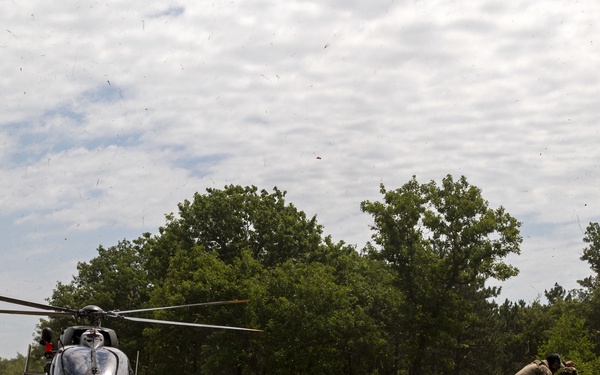 Army and Air National Guardsmen simulate transporting casualties during PATRIOT 21