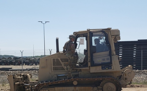 Engineers improve access road at WAREX 86-21-02