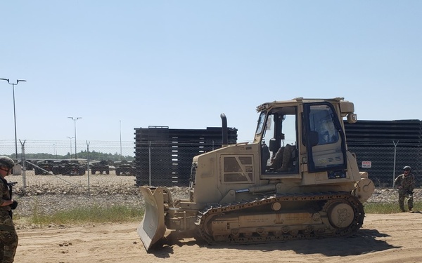 Engineers improve access road at WAREX 86-21-02