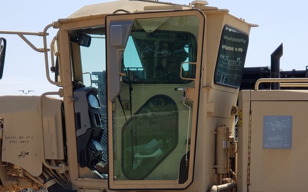 Engineers improve access road at WAREX 86-21-02