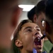 US Navy Sailors conduct a simulated mass casualty drill in response to a helicopter raid training exercise