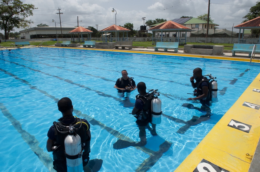 A Canadian Army Combat diver is training Guyana Defence Force divers
