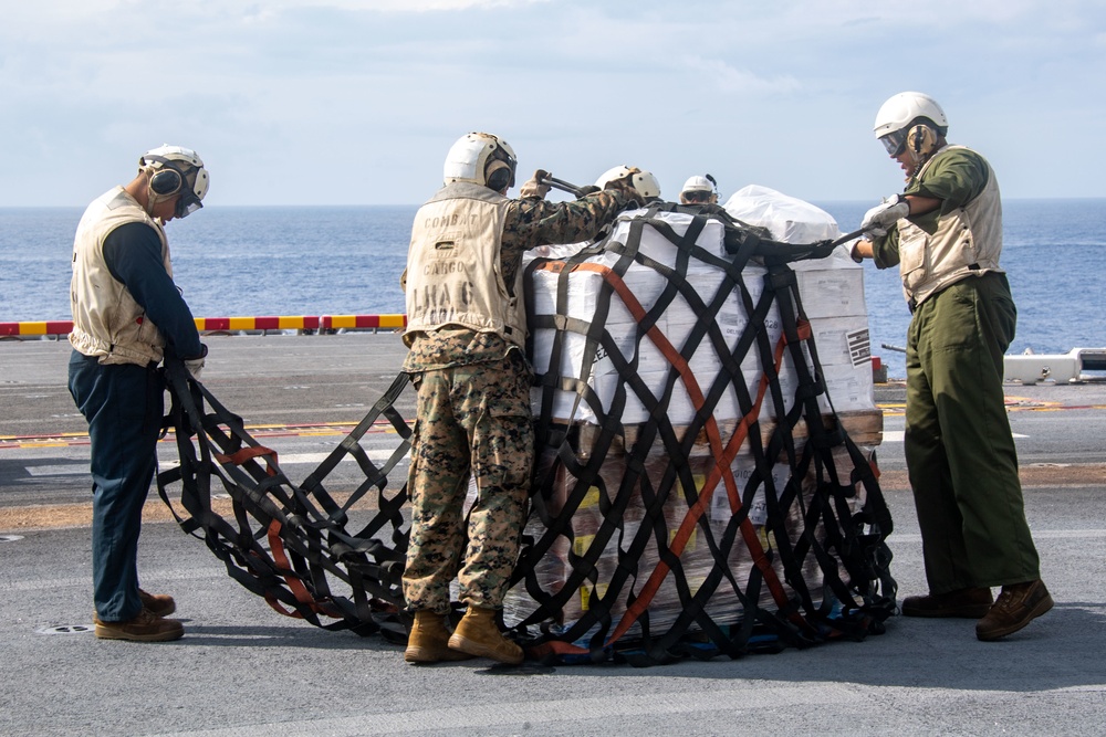 USS America (LHA 6) Conducts A Replenishment-At-Sea