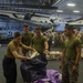 USS America conducts a replenishment-at-sea with the fleet replenishment oiler USNS Rappahannock