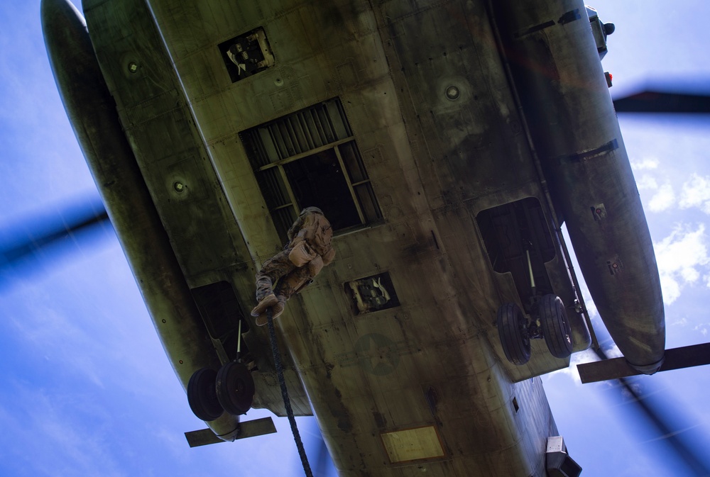 US Marines Fast Rope off a CH-53E Super Stallion
