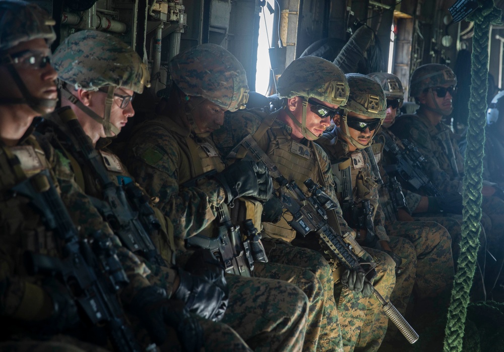 US Marines Fast Rope off a CH-53E Super Stallion