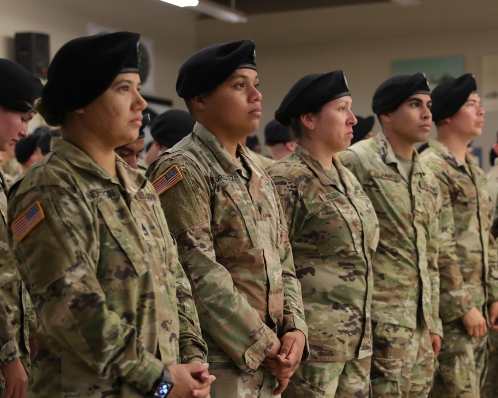 101st Airborne Soldiers stand in formation for re-enlistment