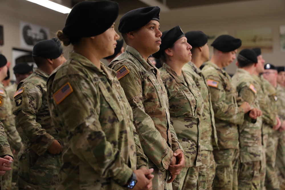 101st Airborne Soldiers stand in formation for re-enlistment