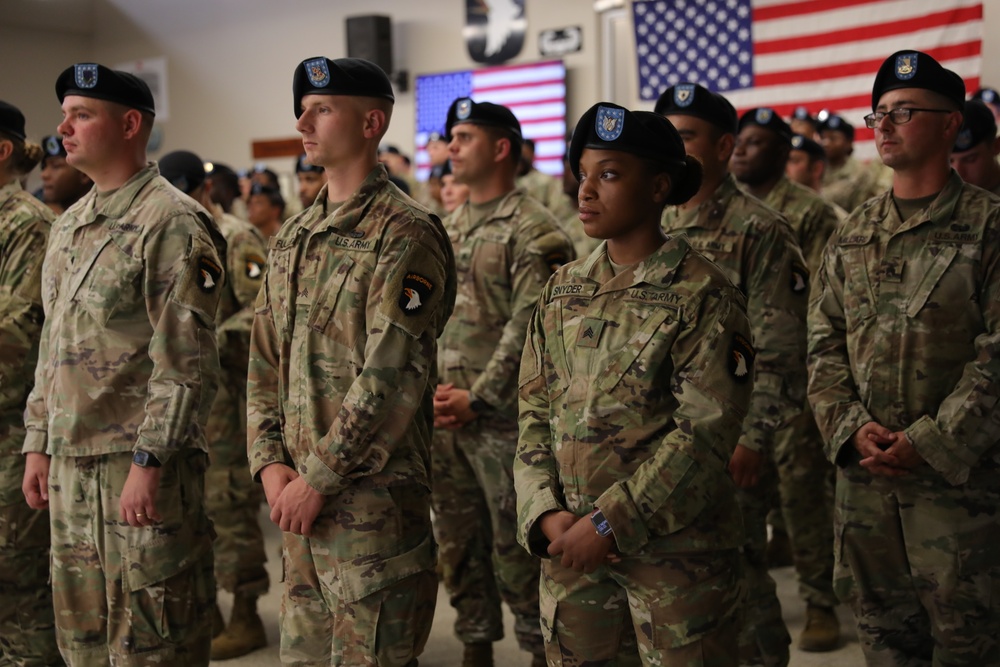 101st Airborne Soldiers stand in formation for re-enlistment