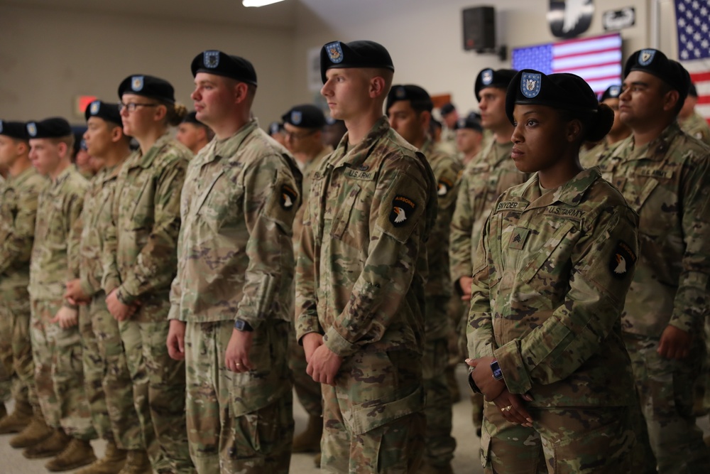 101st Airborne Soldiers stand in formation for re-enlistment