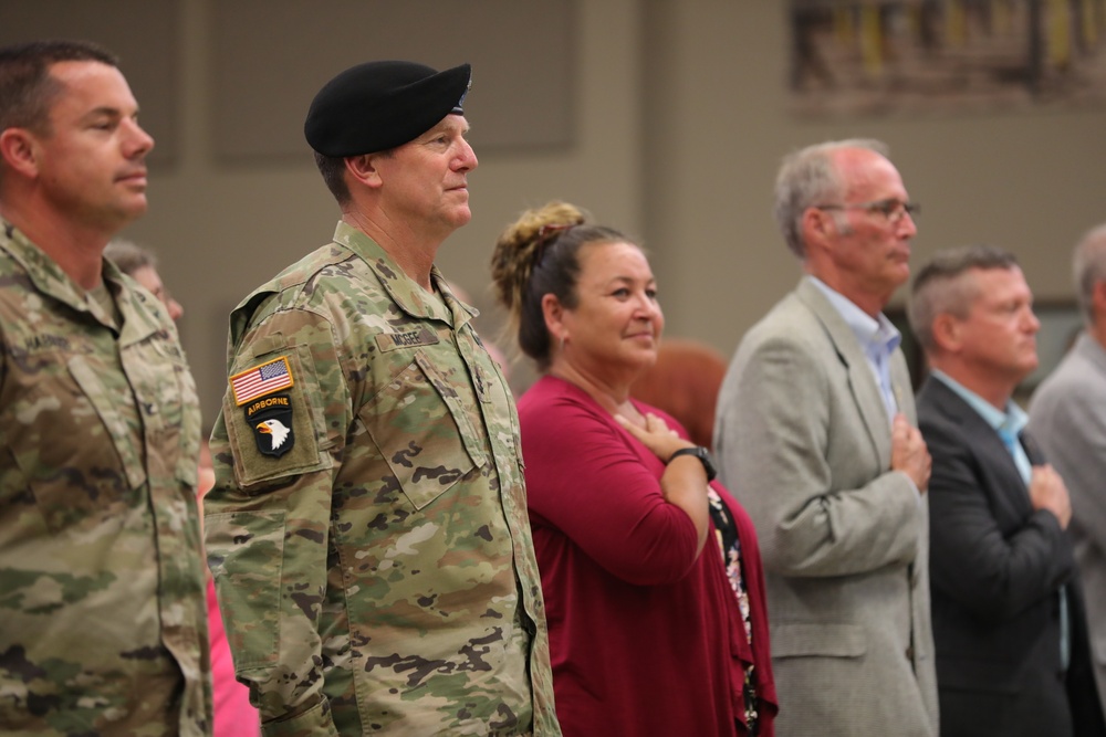 Maj. Gen McGee in audience during &quot;Star Spangled Banner&quot;.