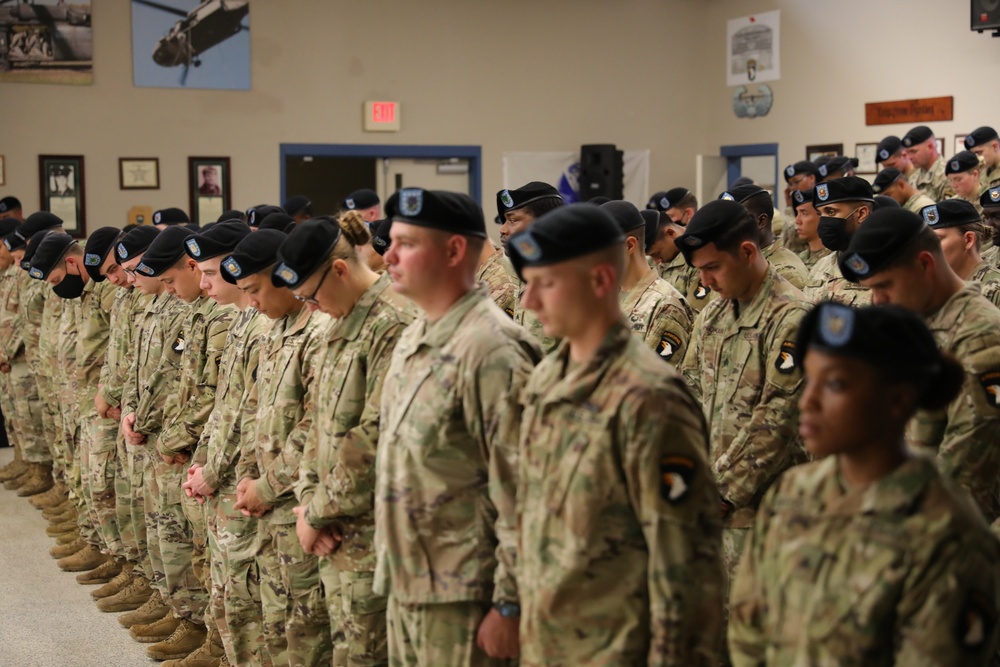 101st Airborne Soldiers stand in formation during invocation.