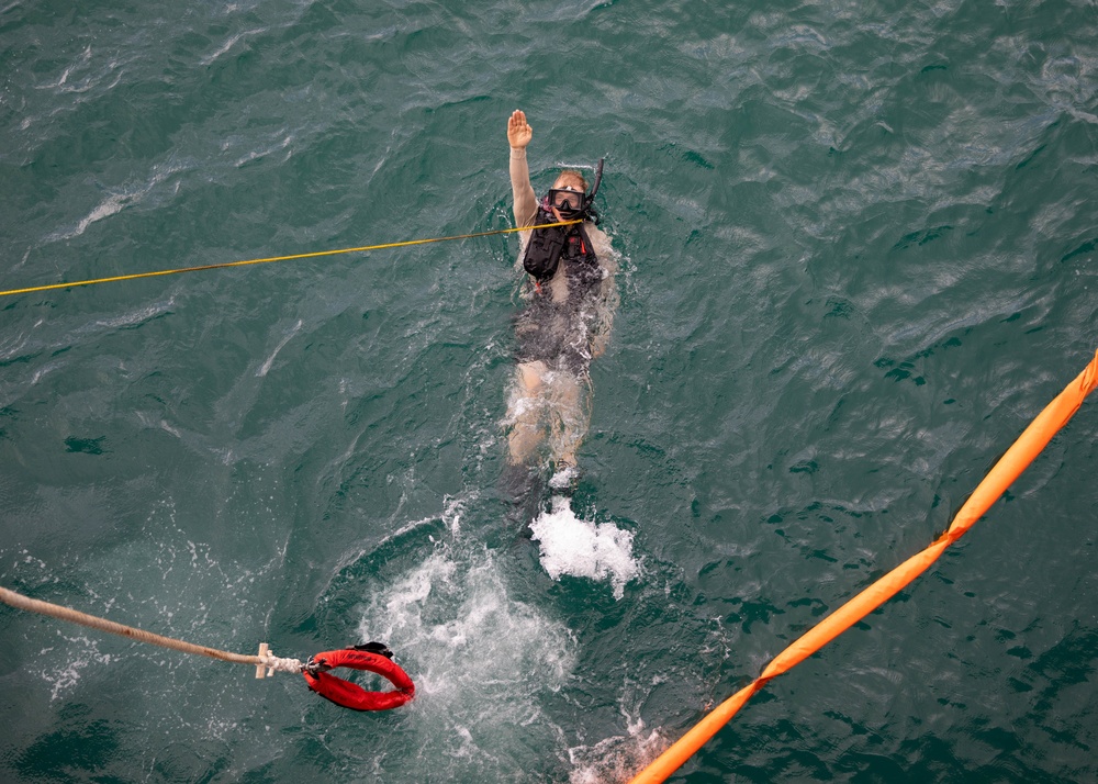 USS Sioux City Sailor Participates in a Man Overboard Drill