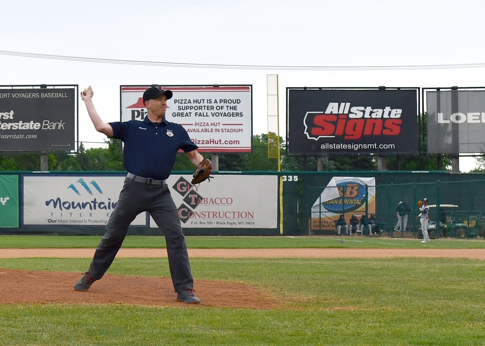 MAFB vice wing commander throws first pitch