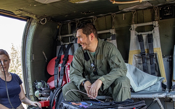 The U.S. Army Aeromedical Research Laboratory conducted airworthiness and aeromedical certification testing for the Medical Hands-free Unified Broadcast (MEDHUB)