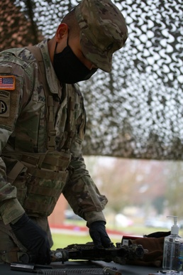 Staff Sgt. Louise Igoy and Spc. Zachary Sanford win NCO/Soldier of the Quarter