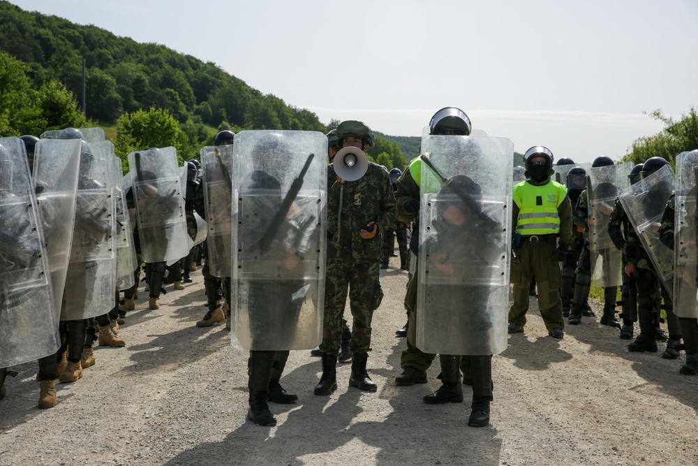 Albanian Soldiers Communicate With The Crowd