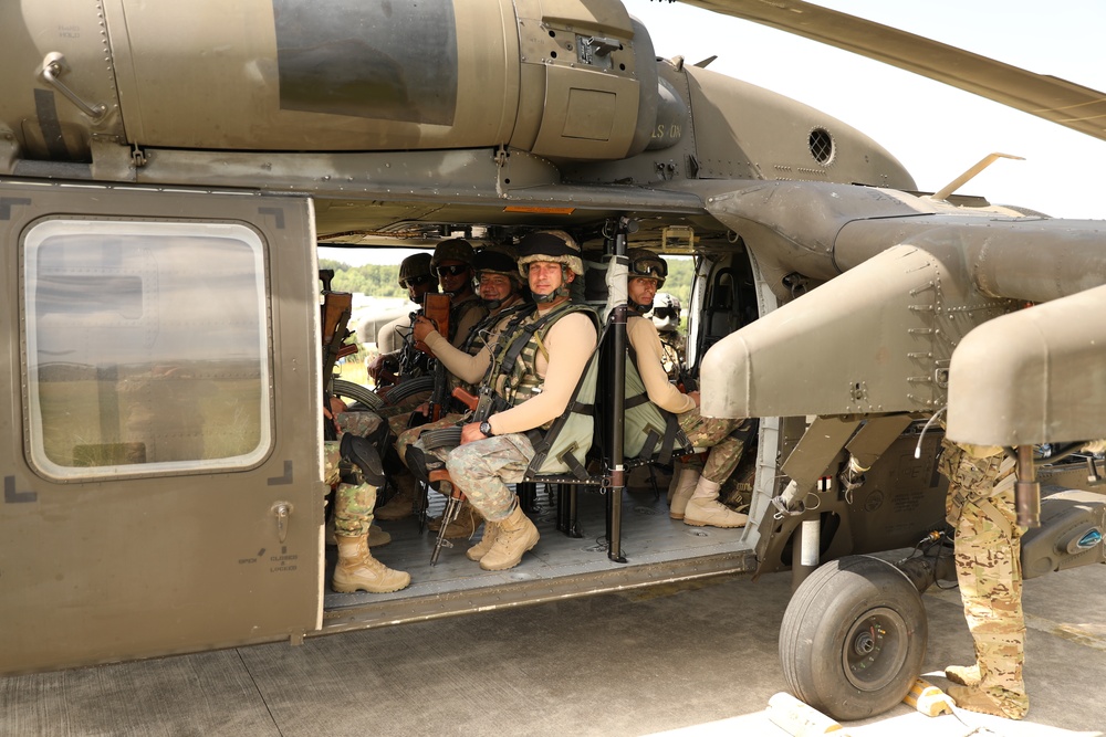 U.S. Army Aviation participates with Romanian soldiers in airlift exercises.