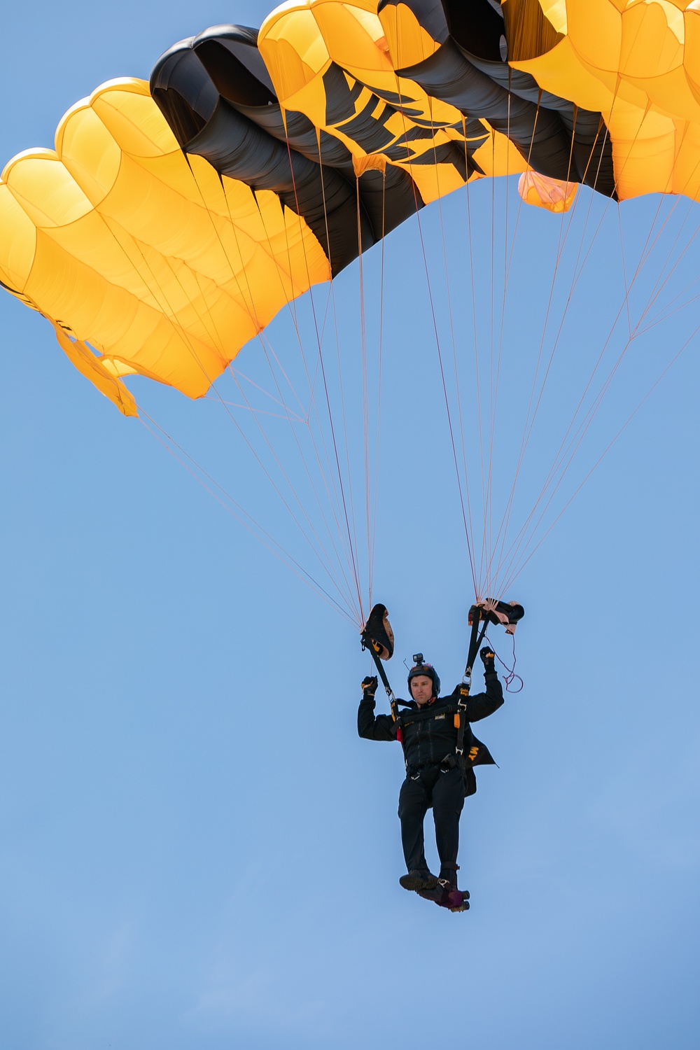 Parachutist on Army Golden Knights makes jump