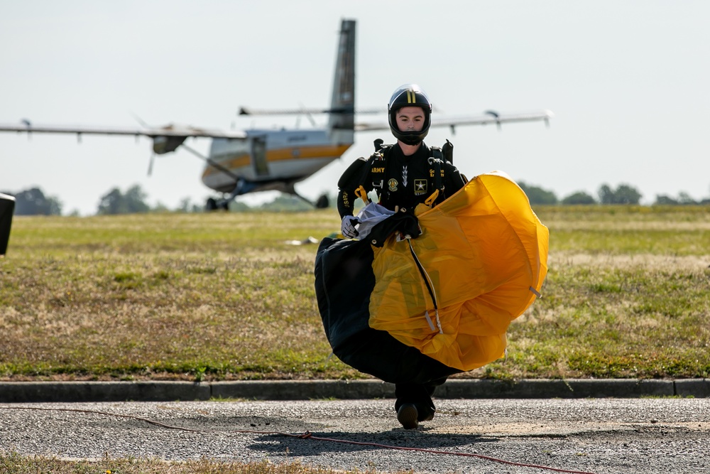 Golden Knights Parachutist with parachute and aircraft