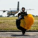 Golden Knights Parachutist with parachute and aircraft