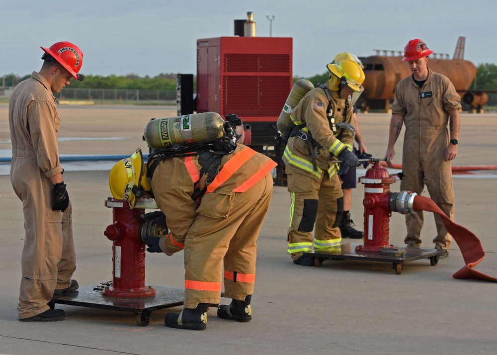 Fire academy students train strength, endurance with hose pulls