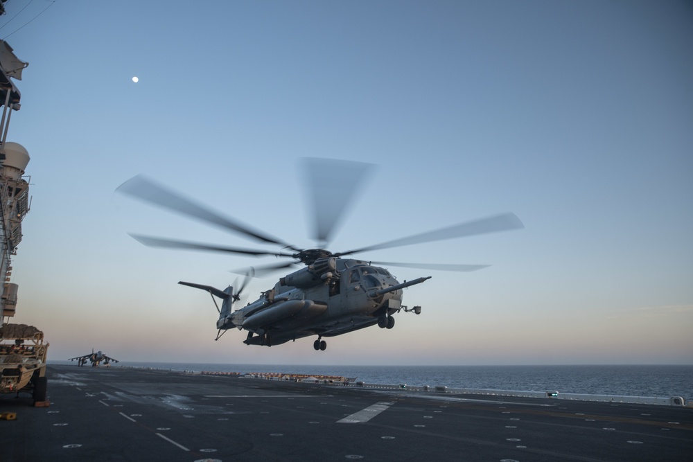 11th MEU Reconnaissance Marines load UTV onto CH-53E Aircraft