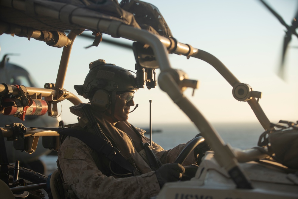 11th MEU Reconnaissance Marines load UTV onto CH-53E Aircraft