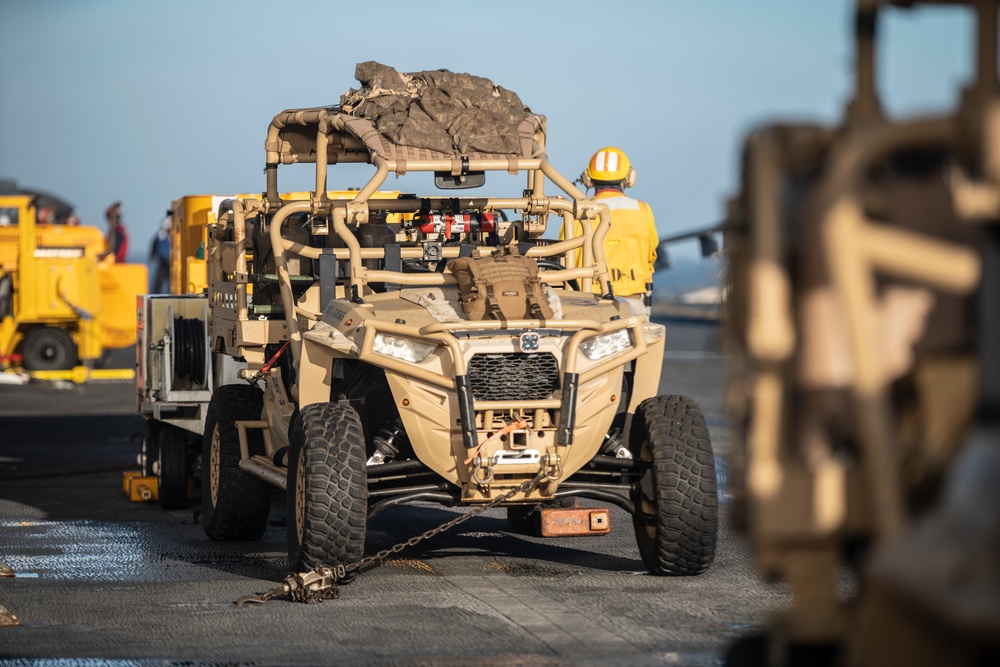 11th MEU Reconnaissance Marines load UTV onto CH-53E Aircraft