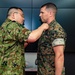 U.S. Marine awarded by JGSDF Major General Tarumi