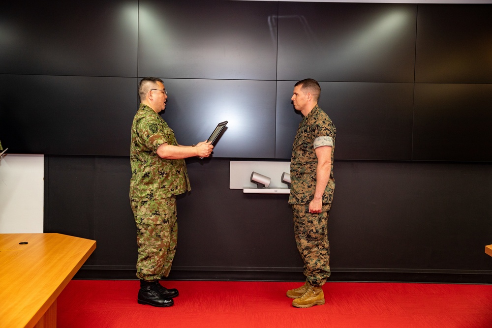 U.S. Marine awarded by JGSDF Major General Tarumi