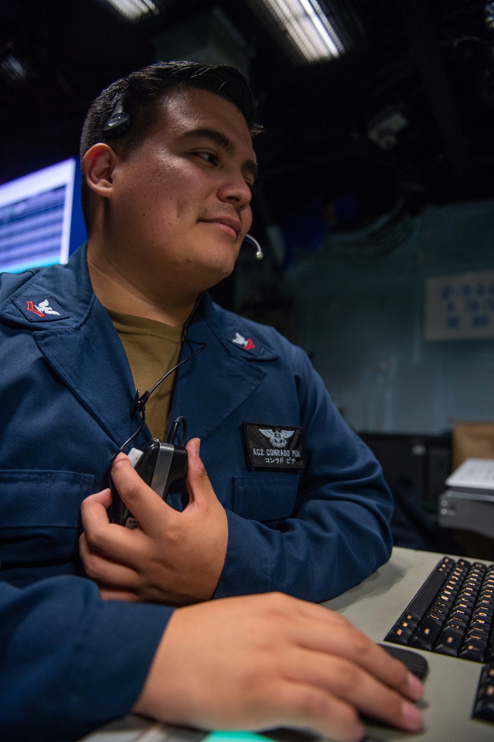 USS America Sailors Monitor Air Traffic