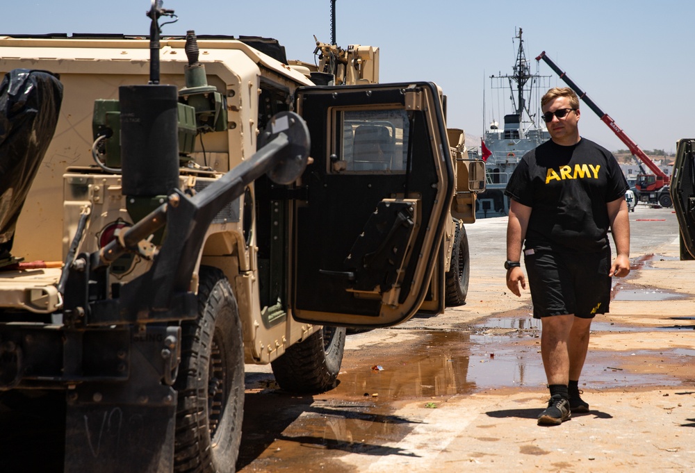 U.S. Army Soldiers Clean Vehicles