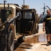 U.S. Army Soldiers Clean Vehicles