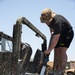 U.S. Army Soldiers Clean Vehicles