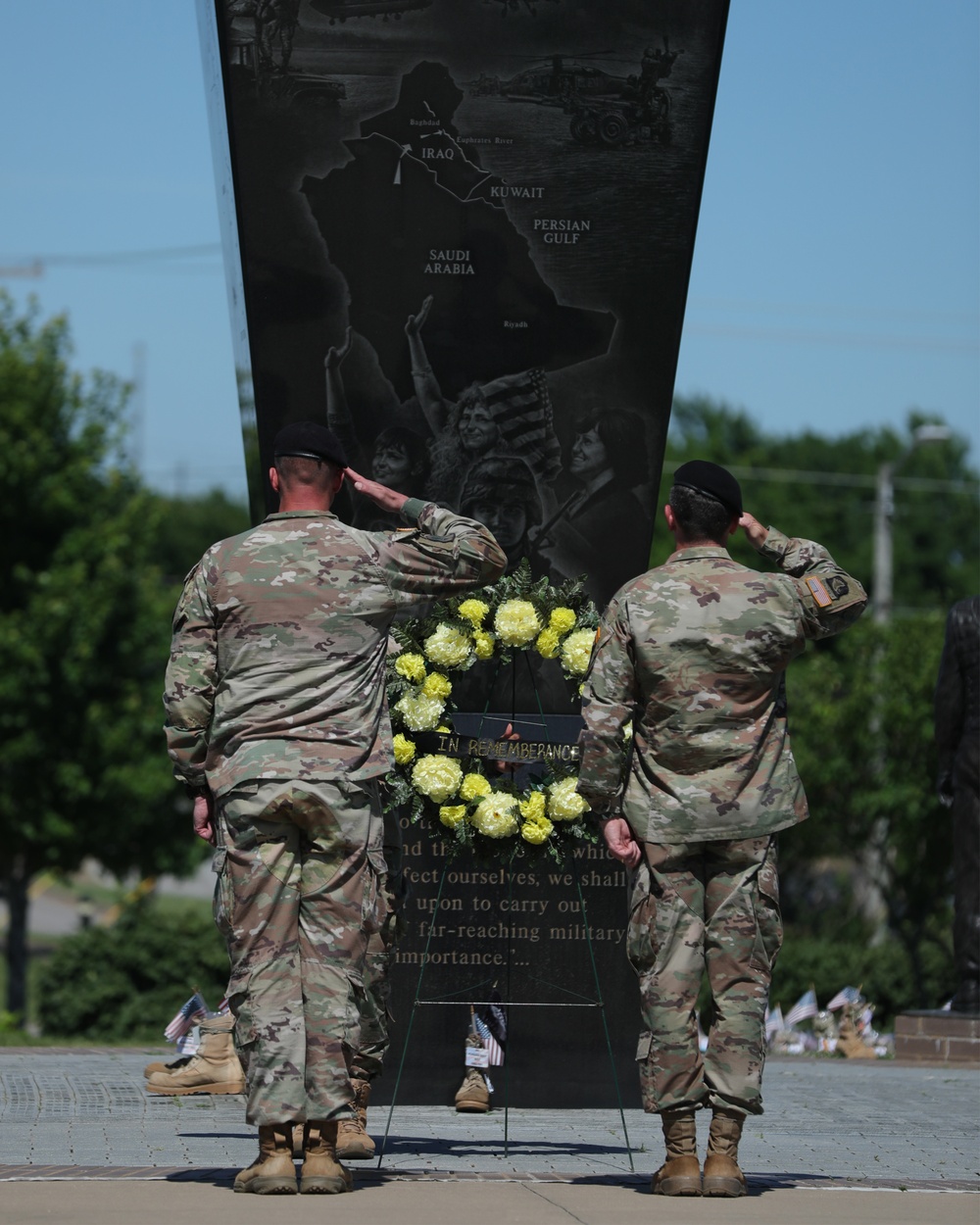 Maj. Gen. McGee and Sgt. Maj. Buda Salute the wreath and monument.