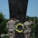 Maj. Gen. McGee and Sgt. Maj. Buda Salute the wreath and monument.