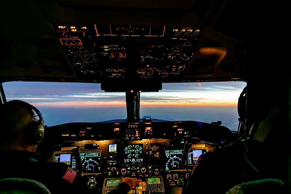 Aviators on Army Golden Knights conduct night flying operations