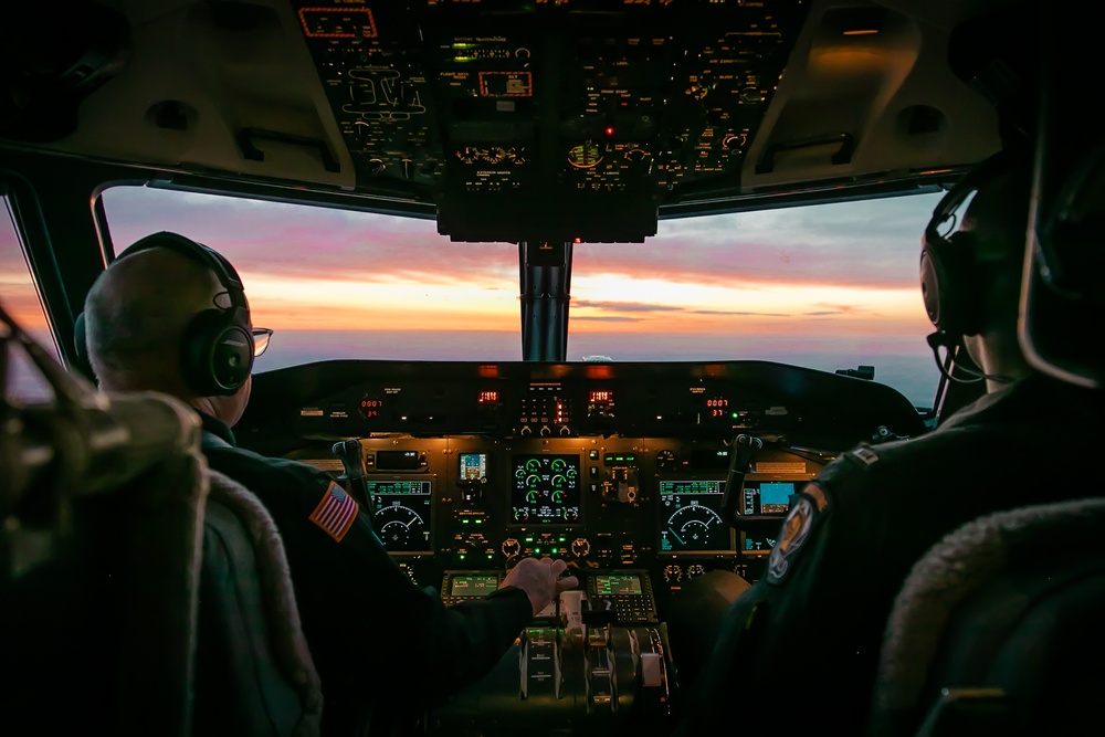 Aviators on Army Golden Knights conduct sunrise flying operations