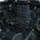 Connecticut Guard upgrades C-130H fleet The image shows the interior cockpit of a large military aircraft, featuring an extensive array of analog gauges, dials, switches, and instruments across a dark instrument panel. The cockpit appears to be from a Cold War-era bomber or transport aircraft, likely a B-52 Stratofortress or similar vintage military aircraft, based on the density and style of instrumentation. The aircraft appears to be on the ground, as tarmac is visible through the cockpit windows.