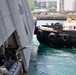 HSC 22 Sailors Observe Tug Boats Assisting USS Sioux City as the Ship Arrives in Martinique, France