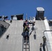 USS Sioux City Sailor Conducts Maintenance on Flight Deck Camera