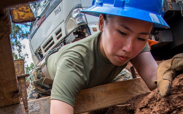 Citizen Airmen, Marines earn Girl Scout construction badge